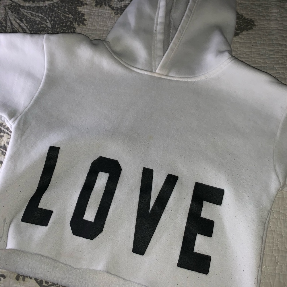 A cropped LOVE hoodie